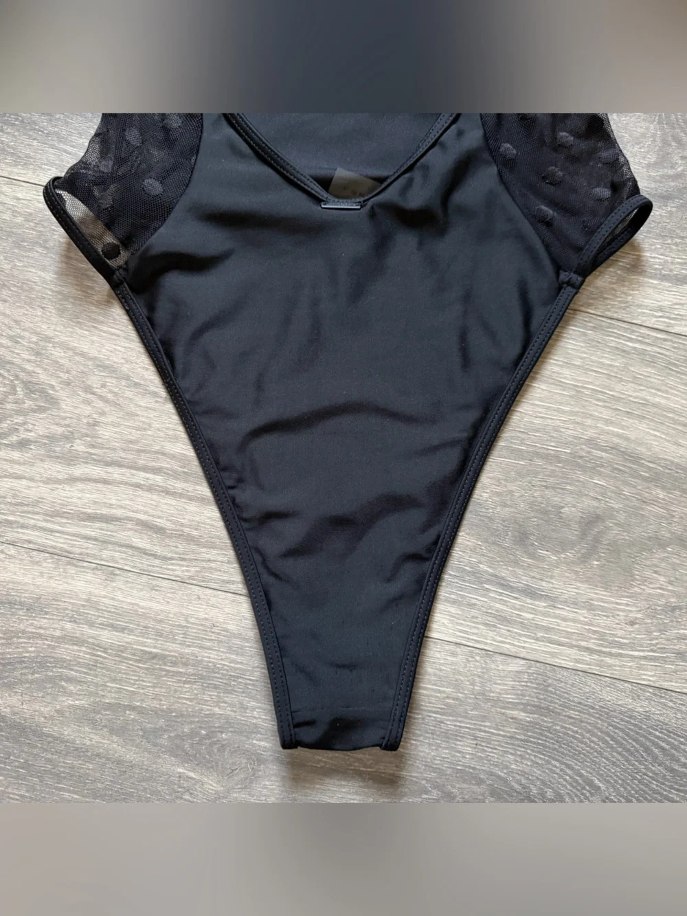 White Fox Swim Low Back Cheeky Black One Piece w Mesh Polka Dot Sides. Size S